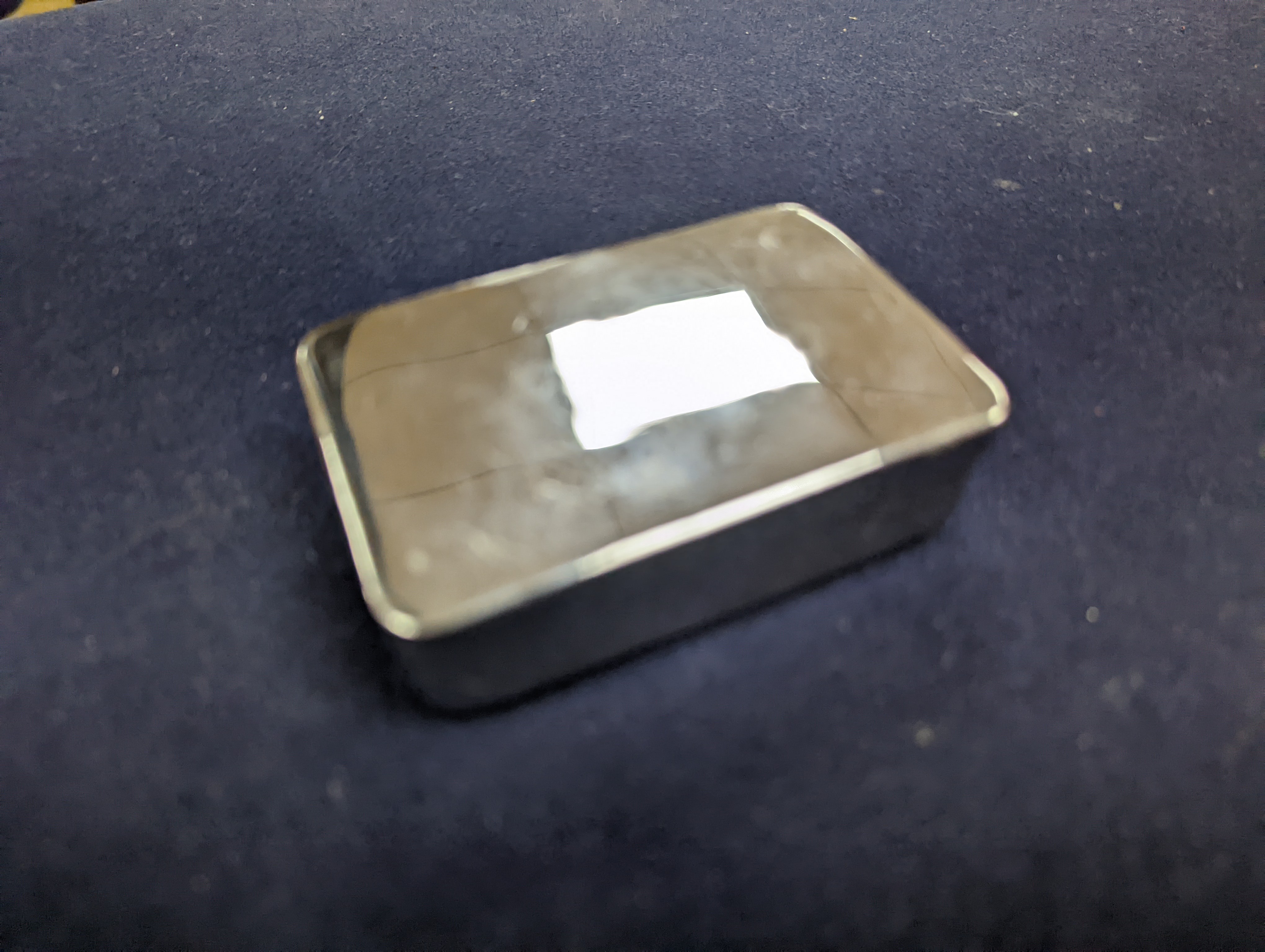 Two Art Deco advertising powder boxes, a similar pack of cards, two fans, leather jewellery boxes, vintage serviettes, etc.